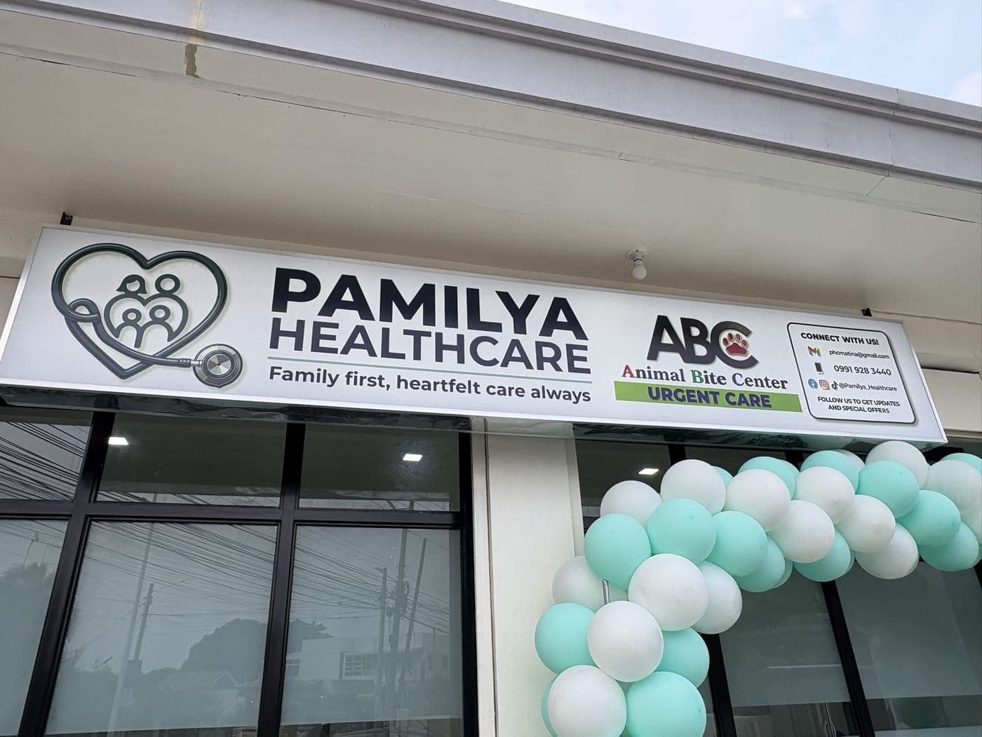 The Pamilya Healthcare storefront with its signboard and the Animal Bite Center — Urgent Care sign